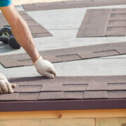 Roofer,Builder,Worker,Installing,Roof,Shingles